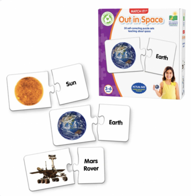 Match It! Out in Space puzzle box front cover showing Earth puzzle piece and a smiling child holding the card