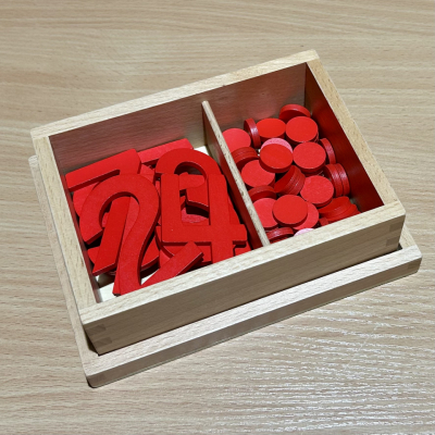 Montessori wooden numerals and counters in a box – red wooden numbers and red plastic discs for learning 1 to 10, even and odd