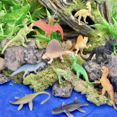 Montessori dinosaur figurines used for sorting, matching, and language activities